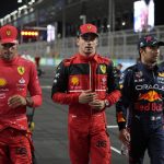 
              From the left, second placed Ferrari driver Charles Leclerc of Monaco, first placed Red Bull driver Sergio Perez of Mexico and third placed Ferrari driver Carlos Sainz of Spain walk after the qualifying session for the Formula One Grand Prix it in Jiddah, Saudi Arabia, Saturday, March 26, 2022. (AP Photo/Hassan Ammar)
            