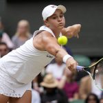 
              Australia's Ashleigh Barty plays a return to Germany's Angelique Kerber during the women's singles semifinals match on day ten of the Wimbledon Tennis Championships in London, Thursday, July 8, 2021. In a shock announcement Wednesday, March 23, 2022, No. 1-ranked Barty announced her retirement from tennis. (AP Photo/Kirsty Wigglesworth)
            