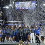 
              Kentucky players and coaches celebrate after beating South Carolina to win the NCAA women's college basketball Southeastern Conference tournament championship game Sunday, March 6, 2022, in Nashville, Tenn. (AP Photo/Mark Humphrey)
            