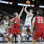 
              Washington's Cole Bajema (22) shoots against Utah during the second half of an NCAA college basketball game in the first round of the Pac-12 tournament Wednesday, March 9, 2022, in Las Vegas. (AP Photo/John Locher)
            