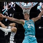 
              Charlotte Hornets center Mason Plumlee blocks a shot by San Antonio Spurs guard Tre Jones during the second half of an NBA basketball game on Saturday, March 5, 2022, in Charlotte, N.C. (AP Photo/Chris Carlson)
            