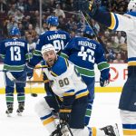 
              St. Louis Blues' Ryan O'Reilly (90) is congratulated by David Perron (57) after scoring a goal against the Vancouver Canucks during the third period of an NHL hockey game Wednesday, March 30, 2022, in Vancouver, British Columbia. (Rich Lam/The Canadian Press via AP)
            