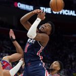
              Washington Wizards forward Rui Hachimura (8) is fouled by Detroit Pistons guard Killian Hayes during the second half of an NBA basketball game, Friday, March 25, 2022, in Detroit. (AP Photo/Carlos Osorio)
            