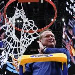 
              Kansas head coach Bill Self cuts down the net after a college basketball game in the Elite 8 round of the NCAA tournament Sunday, March 27, 2022, in Chicago. Kansas won 76-50 to advance to the Final Four. (AP Photo/Nam Y. Huh)
            