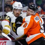 
              Philadelphia Flyers' Ivan Provorov, right, and Vegas Golden Knights' Chandler Stephenson collide during the third period of an NHL hockey game, Tuesday, March 8, 2022, in Philadelphia. (AP Photo/Matt Slocum)
            