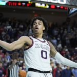 
              Gonzaga's Julian Strawther (0) celebrates during the second half of an NCAA college basketball championship game against Saint Mary's at the West Coast Conference tournament Tuesday, March 8, 2022, in Las Vegas. (AP Photo/John Locher)
            
