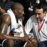 
              FILE - USA Basketball Men's National Team guard Kobe Bryant, left, talks with head coach Mike Krzyzewski during a practice Saturday, July 14, 2012 in Washington. The basketball coach's fingerprints are all over the highest levels of the game after a nearly five-decade head-coaching career. (AP Photo/Alex Brandon, File)
            