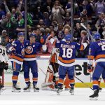 
              New York Islanders left wing Anders Lee (27) celebrates scoring a goal with teammates in the first period of an NHL hockey game against the Anaheim Ducks on Sunday, March 13, 2022, in Elmont, N.Y. (AP Photo/Adam Hunger)
            