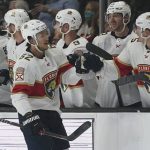 
              Florida Panthers defenseman Brandon Montour (62) celebrates with teammates after scoring during the second period of an NHL hockey game against the Los Angeles Kings Sunday, March 13, 2022, in Los Angeles. (AP Photo/Ashley Landis)
            