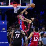 
              Philadelphia 76ers' Tyrese Maxey, left, blocks a shot by Miami Heat's Caleb Martin during the second half of an NBA basketball game, Monday, March 21, 2022, in Philadelphia. (AP Photo/Matt Slocum)
            
