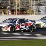 
              NASCAR Cup Series driver William Byron (24) beats Ross Chastain (1) to the finish line during the NASCAR Cup Series auto race at Atlanta Motor Speedway in Hampton, Ga., Sunday, March 20, 2022, (AP Photo/John Bazemore)
            
