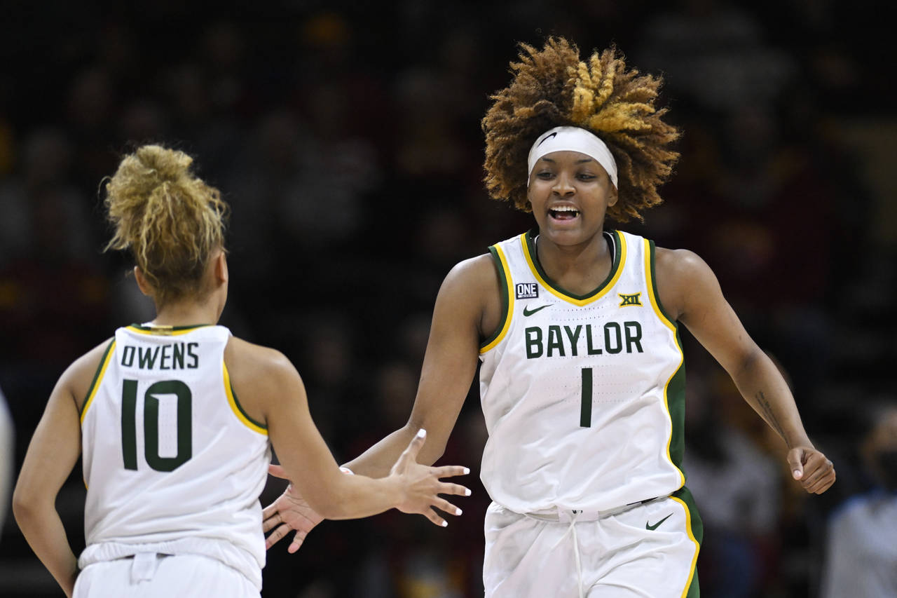 Baylor forward NaLyssa Smith (1) celebrates a play with teammate Jaden Owens (10) during the second...