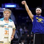 
              Actor Will Ferrell, left, watches as Golden State Warriors guard Klay Thompson warms up for the team's NBA basketball game against the Los Angeles Clippers in San Francisco, Tuesday, March 8, 2022. (AP Photo/Jed Jacobsohn)
            