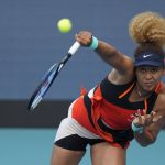 
              Naomi Osaka of Japan serves in her women's semifinal match against Belinda Bencic of Switzerland, at the Miami Open tennis tournament, Thursday, March 31, 2022, in Miami Gardens, Fla. (AP Photo/Rebecca Blackwell)
            