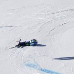 
              Slovenia's Meta Hrovat lies on the course after crashing during the second run of an alpine ski, women's World Cup giant slalom, in Lenzerheide, Switzerland, Sunday, March 6, 2022. (AP Photo/Giovanni Auletta)
            
