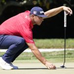 
              Gary Woodland lines up a putt on the first green during the final round of the Arnold Palmer Invitational golf tournament Sunday, March 6, 2022, in Orlando, Fla. (AP Photo/John Raoux)
            