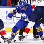 
              Buffalo Sabres center Peyton Krebs (19) kicks the puck during the first period of an NHL hockey game against the Florida Panthers, Monday, March 7, 2022, in Buffalo, N.Y. (AP Photo/Jeffrey T. Barnes)
            