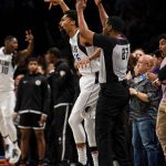 
              Dallas Mavericks guard Spencer Dinwiddie (26) reacts after scoring the game-winning three point shot at the buzzer in the second half of an NBA basketball game against the Brooklyn Nets, Wednesday, March 16, 2022, in New York. (AP Photo/John Minchillo)
            