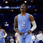 
              North Carolina's Caleb Love reacts during the second half of a college basketball game against UCLA in the Sweet 16 round of the NCAA tournament, Friday, March 25, 2022, in Philadelphia. (AP Photo/Chris Szagola)
            