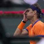 
              Rafael Nadal, of Spain, reacts after losing a point to Carlos Alcaraz, of Spain, during the men's singles semifinals at the BNP Paribas Open tennis tournament Saturday, March 19, 2022, in Indian Wells, Calif. (AP Photo/Mark J. Terrill)
            