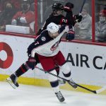 
              Columbus Blue Jackets center Sean Kuraly collides with Ottawa Senators defenseman Artem Zub along the boards during the third period of an NHL hockey game Wednesday, March 16, 2022 in Ottawa, Ontario.(Adrian Wyld/The Canadian Press via AP)
            