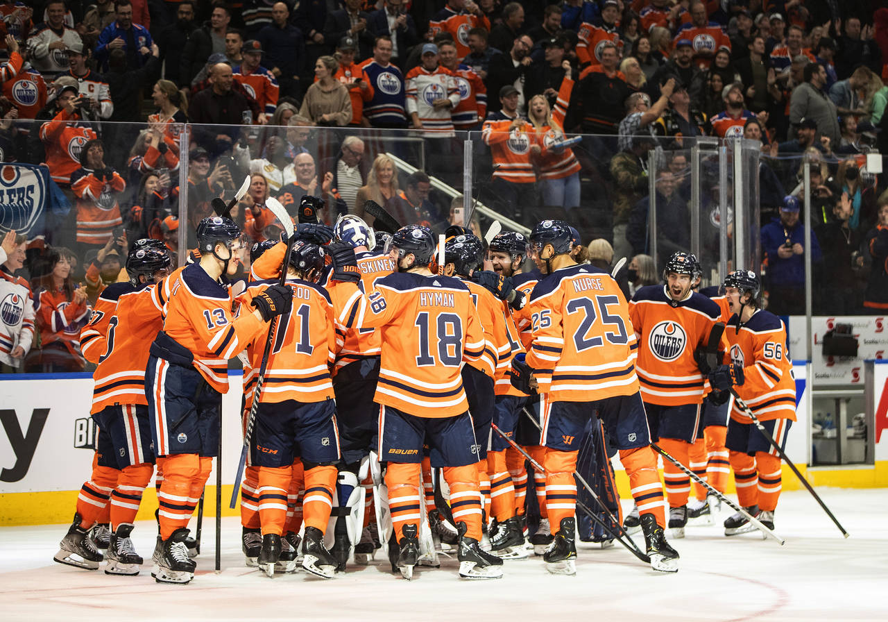 Edmonton Oilers celebrate a shootout win over the Los Angeles Kings in an NHL hockey game Wednesday...
