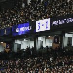
              The final score is seen during the Champions League, round of 16, second leg soccer match between Real Madrid and Paris Saint-Germain at the Santiago Bernabeu stadium in Madrid, Spain, Wednesday, March 9, 2022. (AP Photo/Manu Fernandez)
            