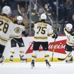 
              Boston Bruins' Brad Marchand (63) celebrates his goal against the Winnipeg Jets during the second period of an NHL hockey game Friday, March 18, 2022 in Winnipeg, Manitoba.(John Woods/The Canadian Press via AP)
            