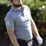 
              Tyrrell Hatton, of England, watches his shot from the 16th fairway during the second round of the Arnold Palmer Invitational golf tournament Friday, March 4, 2022, in Orlando, Fla. (AP Photo/John Raoux)
            