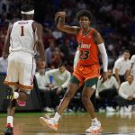 
              Miami guard Kameron McGusty celebrates after scoring against Southern California during the second half of a college basketball game in the first round of the NCAA tournament on Friday, March 18, 2022, in Greenville, S.C. (AP Photo/Chris Carlson)
            