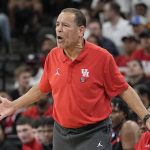 
              Houston head coach Kelvin Sampson yells during the first half of a college basketball game against Villanova in the Elite Eight round of the NCAA tournament on Saturday, March 26, 2022, in San Antonio. (AP Photo/David J. Phillip)
            
