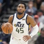
              Utah Jazz guard Donovan Mitchell (45) brings the ball upcourt against the Milwaukee Bucks during the first half of an NBA basketball game Monday, March 14, 2022, in Salt Lake City. (AP Photo/Rick Bowmer)
            
