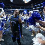 
              Kentucky's Robyn Benton (1) leaves the court after Kentucky beat Tennessee in an NCAA college basketball semifinal round game at the women's Southeastern Conference tournament Saturday, March 5, 2022, in Nashville, Tenn. (AP Photo/Mark Humphrey)
            