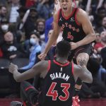 
              Toronto Raptors forward Pascal Siakam (43) celebrates his basket against the Cleveland Cavaliers with forward Scottie Barnes (4) during the second half of an NBA basketball game Thursday, March 24, 2022, in Toronto. (Nathan Denette/The Canadian Press via AP)
            