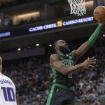 
              Boston Celtics guard Jaylen Brown lays the ball up during the first quarter of the team's NBA basketball game against the Sacramento Kings in Sacramento, Calif., Friday, March 18, 2022. (AP Photo/Randall Benton)
            