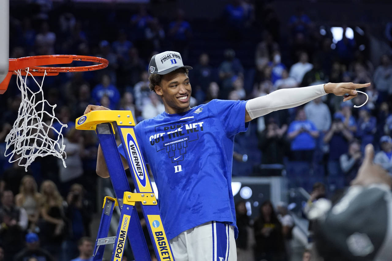 Duke forward Wendell Moore Jr. celebrates after Duke defeated Arkansas in a college basketball game...