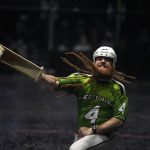 
              Dennis Dalton, known by the moniker "El Barba," Spanish for "The Beard," competes in a doubles Jai Alai match in the fronton at Magic City Casino, Sunday, March 13, 2022, in Miami. What could be Jai Alai's last stand is taking place at Magic City Casino, where a small group of committed enthusiasts are doing all they can to save the game that originated in the Basque region of Spain and France but took root in Miami during the go-go days of of the 1970s and 1980s. (AP Photo/Rebecca Blackwell)
            