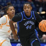 
              Kentucky's Dre'una Edwards (44) dribbles past Tennessee's Alexus Dye (2) in the first half of an NCAA college basketball semifinal round game at the women's Southeastern Conference tournament Saturday, March 5, 2022, in Nashville, Tenn. (AP Photo/Mark Humphrey)
            