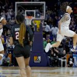 
              LSU guards Jailin Cherry, right, and Khayla Pointer, left, react in the second half of a women's college basketball game against Jackson State in the first round of the NCAA tournament, Saturday, March 19, 2022, in Baton Rouge, La. (AP Photo/Matthew Hinton)
            