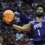 
              TCU guard Mike Miles Jr. drives to the hoop during the first half of a first-round NCAA college basketball tournament game against Seton Hall, Friday, March 18, 2022, in San Diego. (AP Photo/Denis Poroy)
            