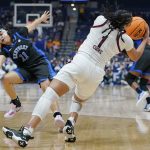
              South Carolina's Zia Cooke (1) collides with Kentucky's Jada Walker (11) in the first half of the NCAA women's college basketball Southeastern Conference tournament championship game Sunday, March 6, 2022, in Nashville, Tenn. (AP Photo/Mark Humphrey)
            
