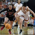 
              Utah guard Kennady McQueen (24) and Texas guard Audrey Warren (31) chase the ball during the first half of a college basketball game in the second round of the NCAA women's tournament, Sunday, March 20, 2022, in Austin, Texas. (AP Photo/Eric Gay)
            