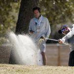 
              Adam Scott hits out of a bunker on the sixth fairway in the second round of the Dell Technologies Match Play Championship golf tournament, Thursday, March 24, 2022, in Austin, Texas. (AP Photo/Tony Gutierrez)
            