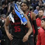 
              Houston forward Fabian White Jr. leaves the court after their loss against Villanova during a college basketball game in the Elite Eight round of the NCAA tournament on Saturday, March 26, 2022, in San Antonio. (AP Photo/Eric Gay)
            