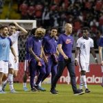 
              United States' coach Gregg Berhalter, center, and his team's players leaves the pitch after losing 0-2 to Costa Rica at a qualifying soccer match for the FIFA World Cup Qatar 2022 in San Jose, Costa Rica, Wednesday, March 30, 2022. (AP Photo/Moises Castillo)
            