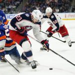 
              Columbus Blue Jackets' Brendan Gaunce (23) fights for control of the puck with New York Islanders' Casey Cizikas (53) during the third period of an NHL hockey game Thursday, March 31, 2022, in Elmont, N.Y. The Islanders won 5-2. (AP Photo/Frank Franklin II)
            