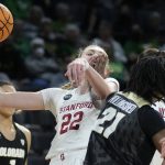 
              Colorado's Mya Hollingshed (21) fouls Stanford's Cameron Brink (22) during the first half of an NCAA college basketball game in the semifinal round of the Pac-12 women's tournament Friday, March 4, 2022, in Las Vegas. (AP Photo/John Locher)
            
