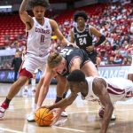
              Washington State guard Noah Williams (24) fights for a loose ball against Santa Clara forward Jacob Holt (15) during the first half of an NCAA college basketball game in the NIT on Tuesday, March 15, 2022, in Pullman, Wash. (Zach Wilkinson/Lewiston Tribune via AP)
            