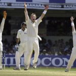 
              FILE - Australian bowler Shane Warne, center, celebrates after taking the wicket of India's VVS Laxman, second left, alongwith other Australian players on the fourth day of the first test match between India and Australia at the Chinnaswamy Stadium in Bangalore, India, Saturday, Oct. 9, 2004. Shane Warne, one of the greatest cricket players in history, has died. He was 52. Fox Sports television, which employed Warne as a commentator, quoted a family statement as saying he died of a suspected heart attack in Koh Samui, Thailand. (AP Photo/Gautam Singh, File)
            