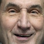 
              Duke coach Mike Krzyzewski smiles as he answers a question during a news conference at the men's Final Four NCAA college basketball tournament Thursday, March 31, 2022, in New Orleans. North Carolina will play Duke Saturday. (AP Photo/David J. Phillip)
            